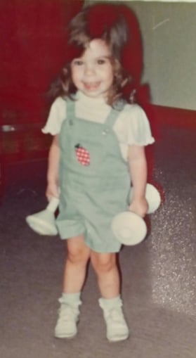 me as a toddler lifting weights